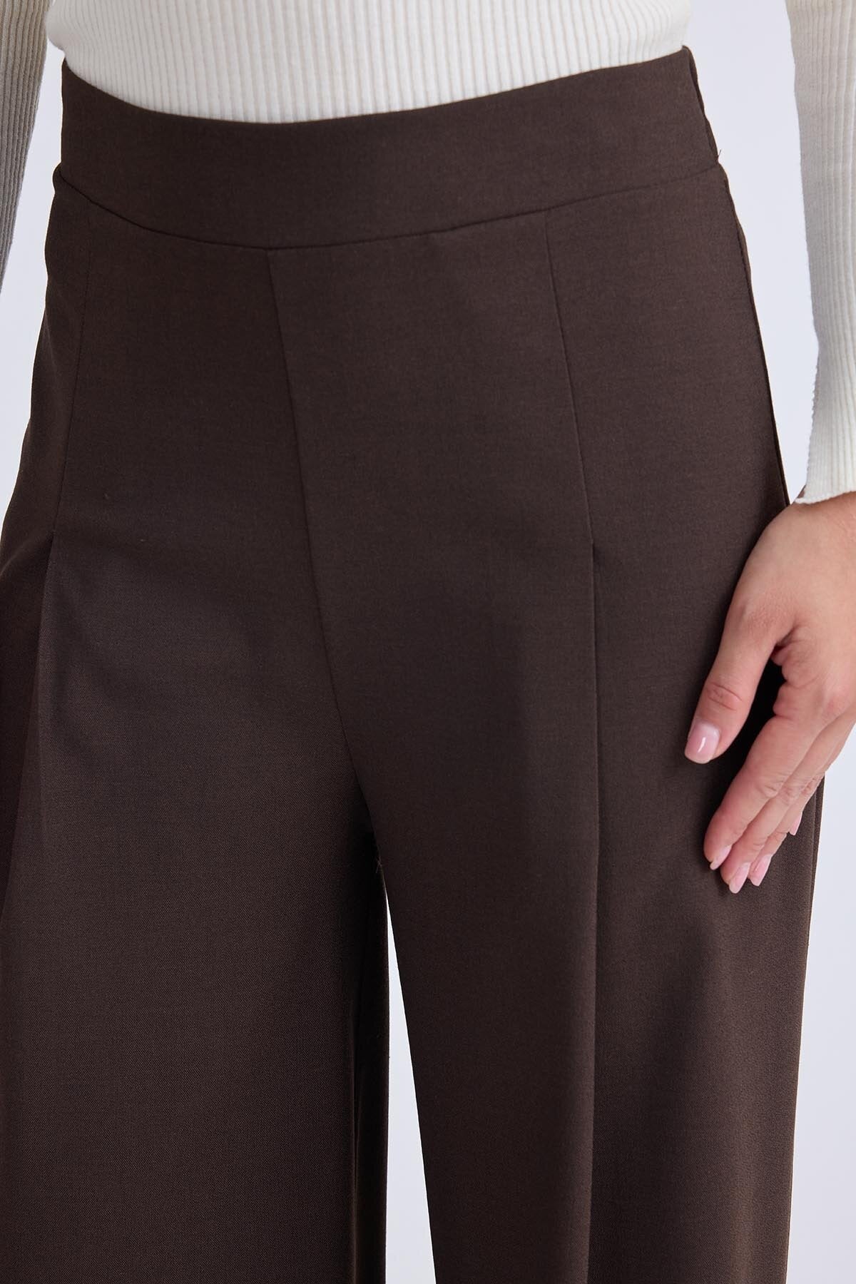 Beli Lastikli Pileli Geniş Paça Pantolon