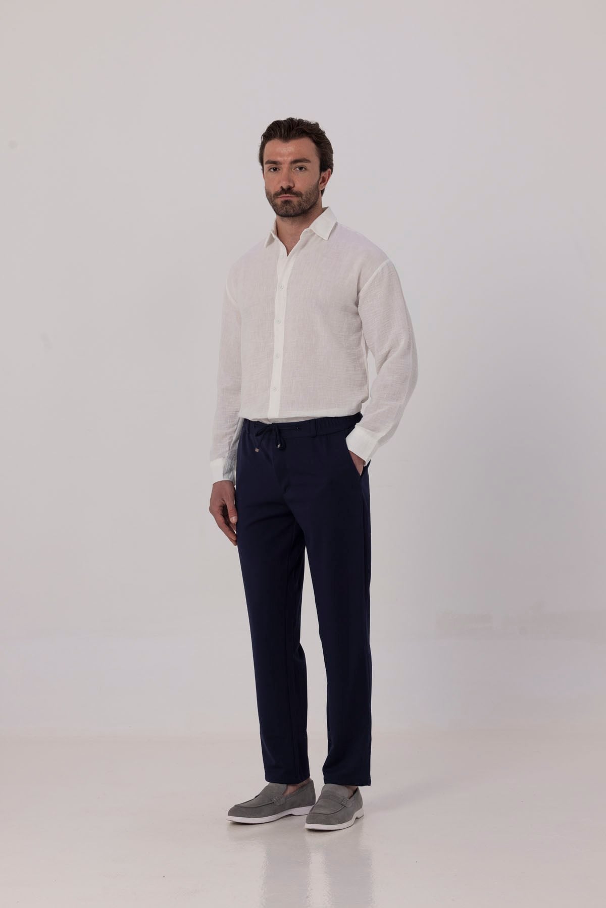 Açık Lacivert Dokulu Arka Lastikli Köprü Kemerli Bağcıklı Slim Fit Jogger Pantolon