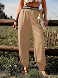Women's High-Waisted Pera Trousers with Elastic Waist, Draped Fit, and Waistband Stripes